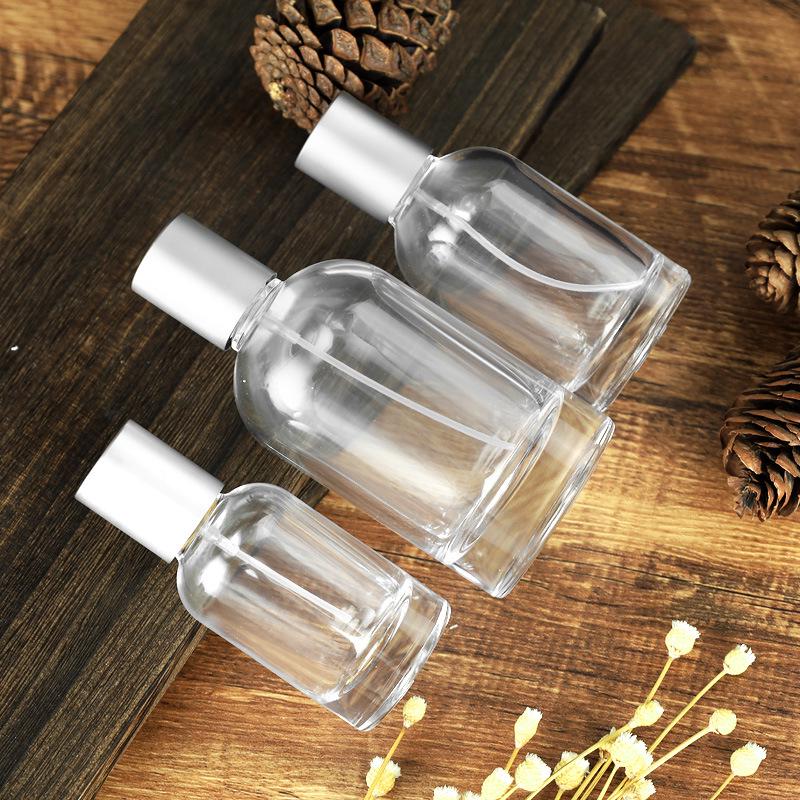 50ml Cylindrical Glass Perfume Spray Bottle, Transparent and Refillable