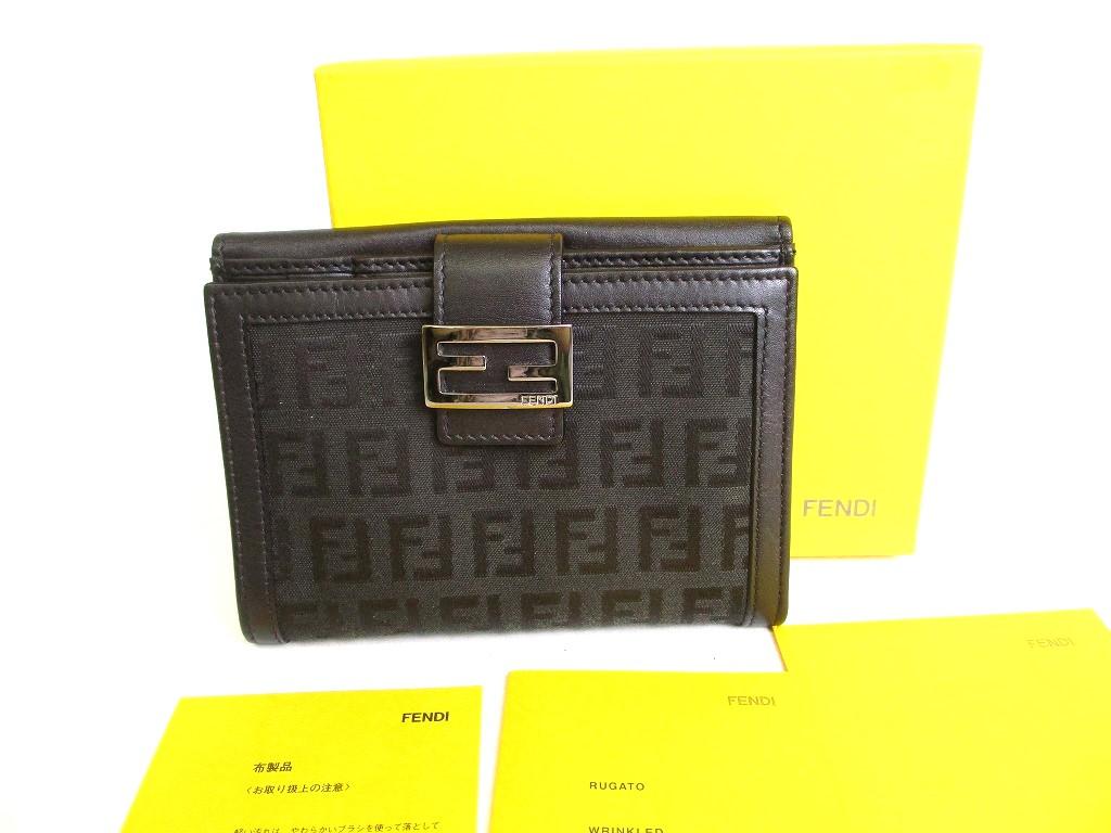 

Автентичний шкіряний гаманець FENDI Zucca Canvas Black Canvas Compact Wallet #9347 Refurbished