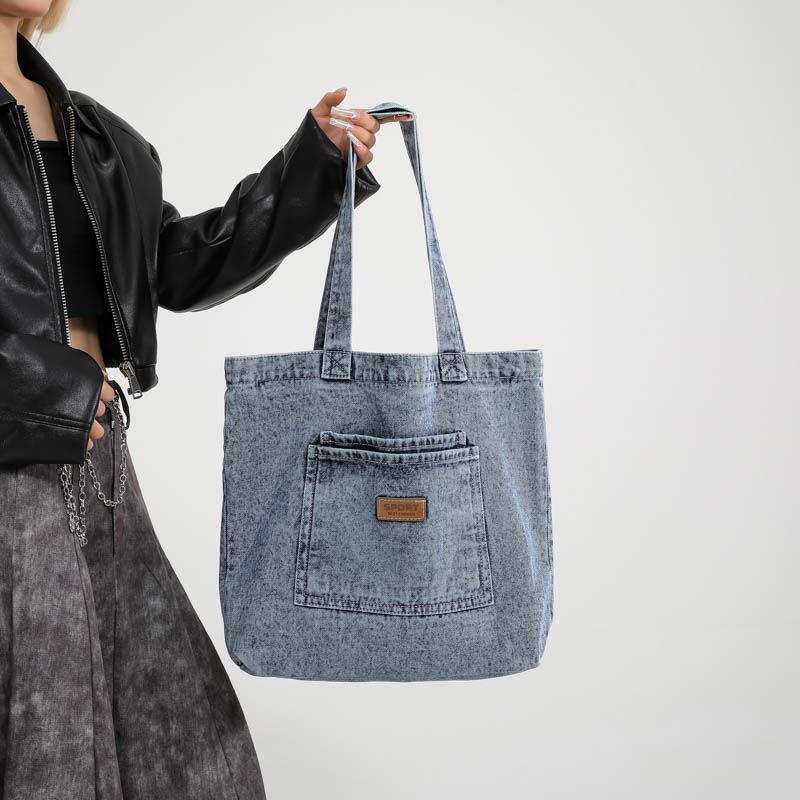 

Универсальная джинсовая сумка-тоут и кроссбоди в корейском стиле - 2025, Большая вместимость, Женский повседневный тренд для поездок. 40.5 x 10 x 34 cm