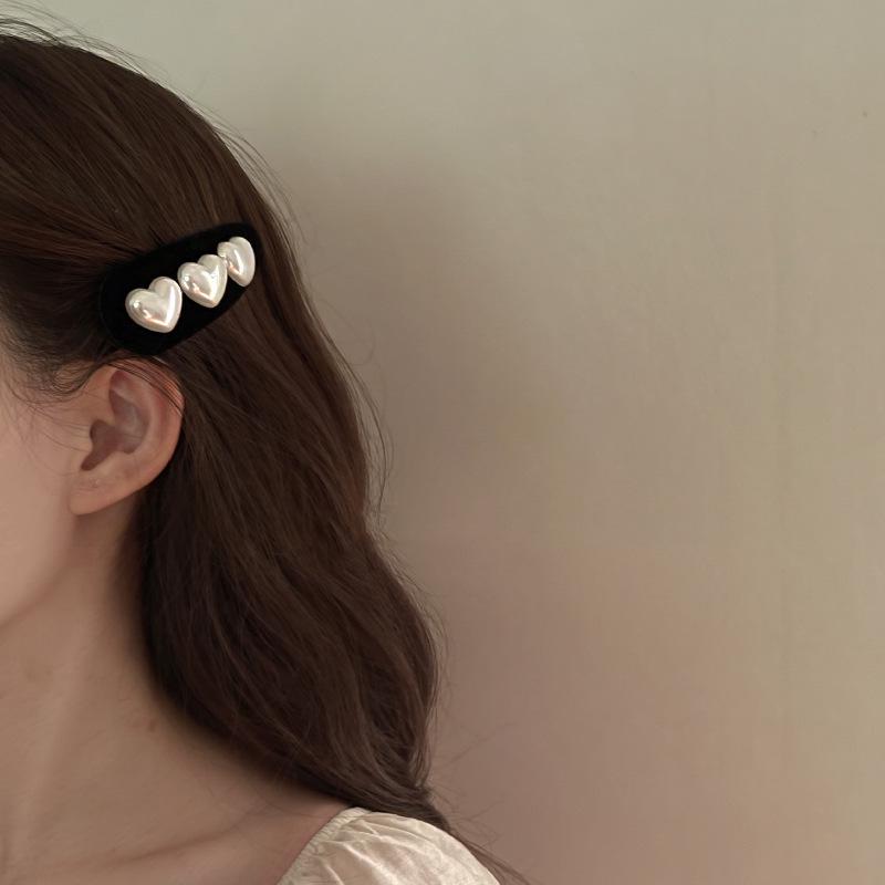 Premium Love Heart Hårnål: Elegant hårklipp for kvinner med enkel vanndråpedesign for elegant stil