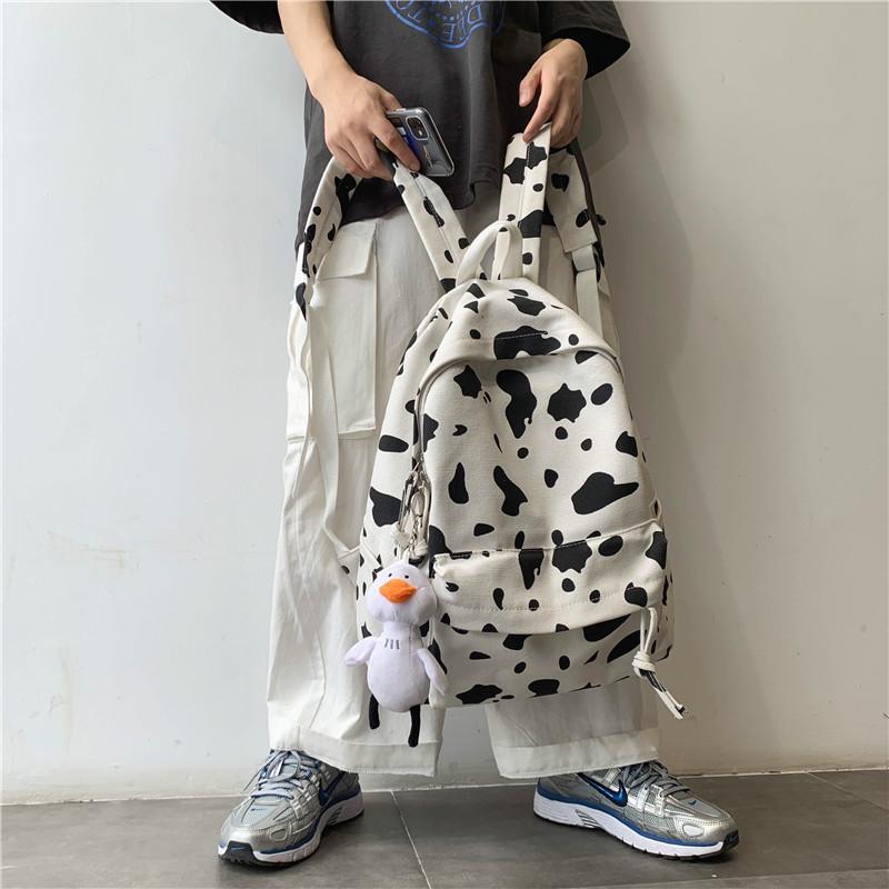 Schoolbag female Korean version Harajuku ulzzang Mori girl canvas backpack ins fire cow pattern backpack