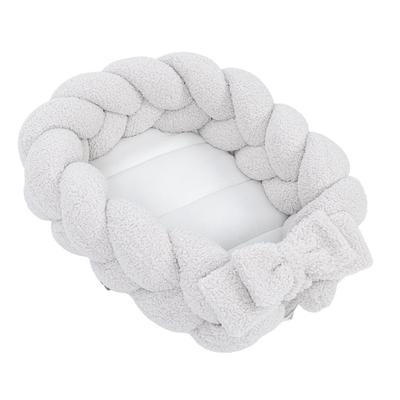 Babykokon mit schützendem Zopf – Bearly