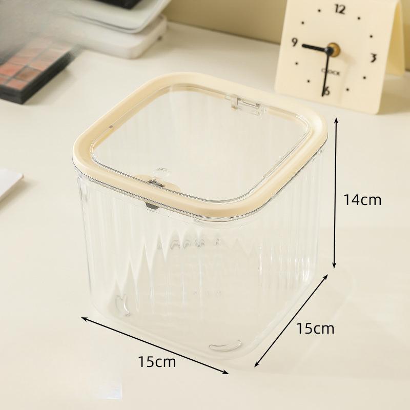 Mini und niedlicher Auto-Aufbewahrungs-Drucktyp-Desktop-Mülleimer auf dem Schlafzimmer-Couchtisch und Haushaltstisch