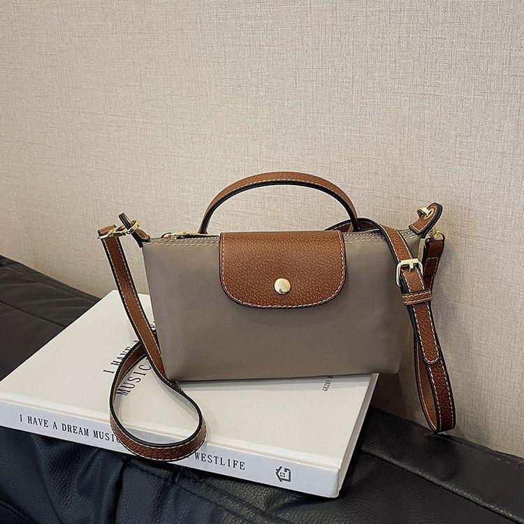 Elegant Lightweight Crossbody Handbag: Versatile Women's Commuter Bag with Phone and Coin Pockets