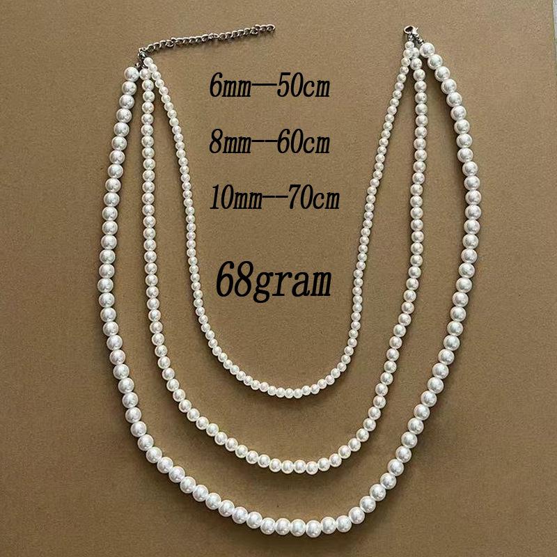 Shi Family Multi-Layer Pearl Necklace: Elegant, Versatile, Retro-Inspired Imitation Pearl Choker.