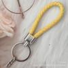 Gevlochten Lederen Touw Sleutelhanger met Poppenhanger - Modieus en Creatief Accessoire