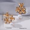 Floral temperament stud earrings Lily flower high-end earrings Women's imitation pearl geometric earrings