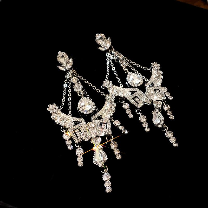 

Серьга-кисточка в виде цветка и капли воды со стразами для женщин, серьга класса люкс для женщин, темперамент, ощущение высокого класса, циркон Zinc Alloy