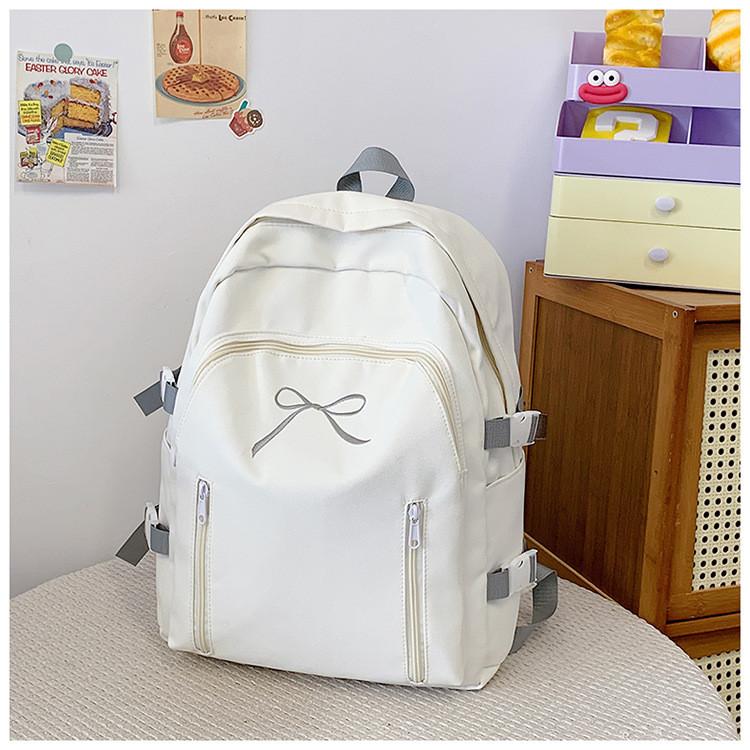 Basic Pink Nylon Student Backpack With Bow Design For School Use