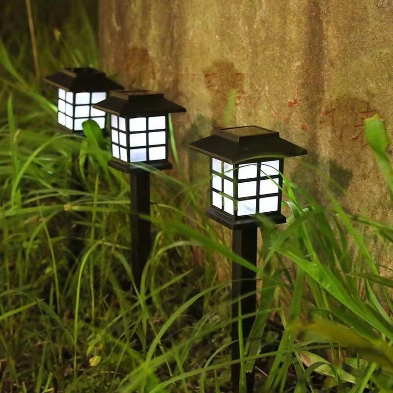 

Solar-Powered Garden House Landscape Lights (4-Pack)