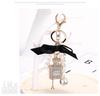 Korean-Style Handmade Rhinestone Perfume Bottle Keychain with Bow and Pearl Charm