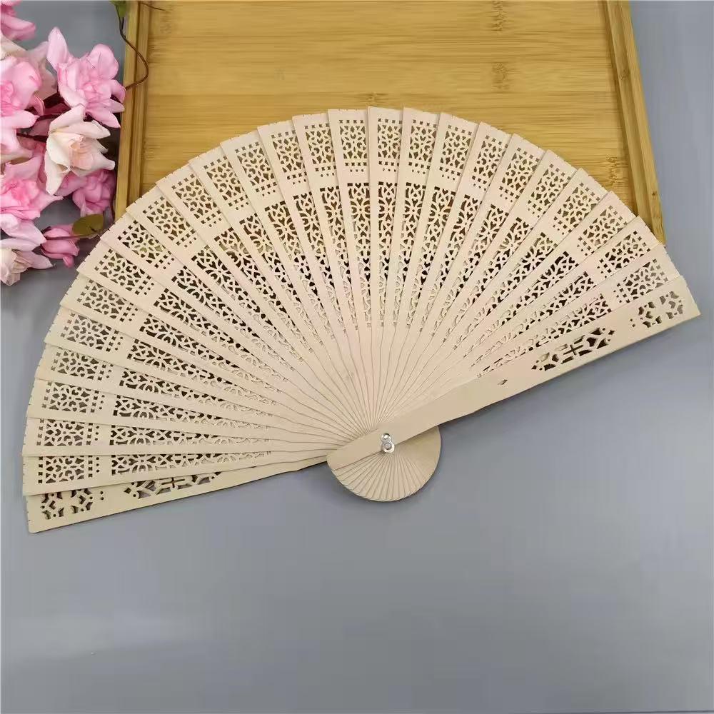 Handheld Folding Fan with Intricate Laser Cut Pattern Lightweight Wooden Frame Elegant Design for Personal Use and Decoration