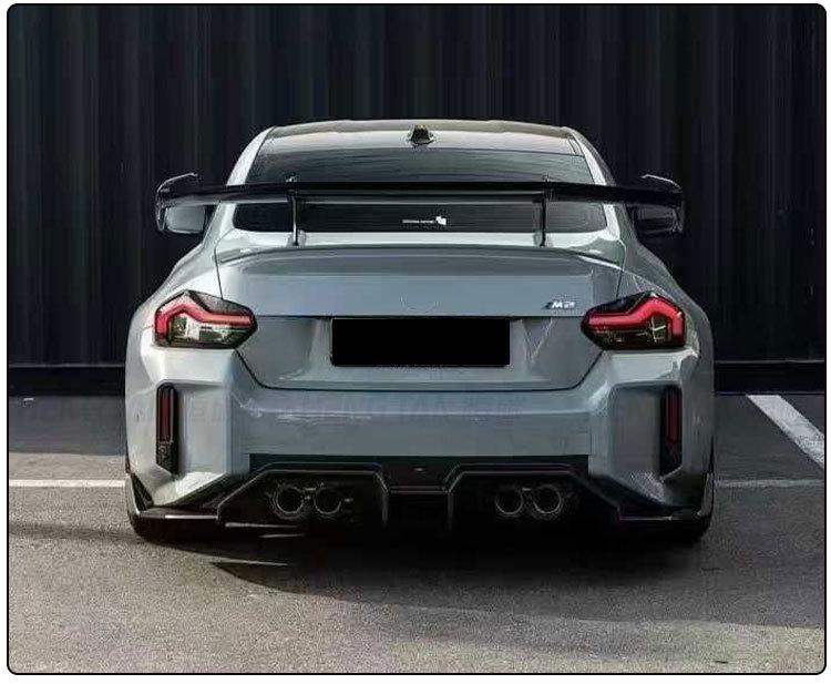 Carbon Fiber Body Kit for BMW M2 G87 (2023+): AD Style Front Lip, Rear Lip, Side Skirts.