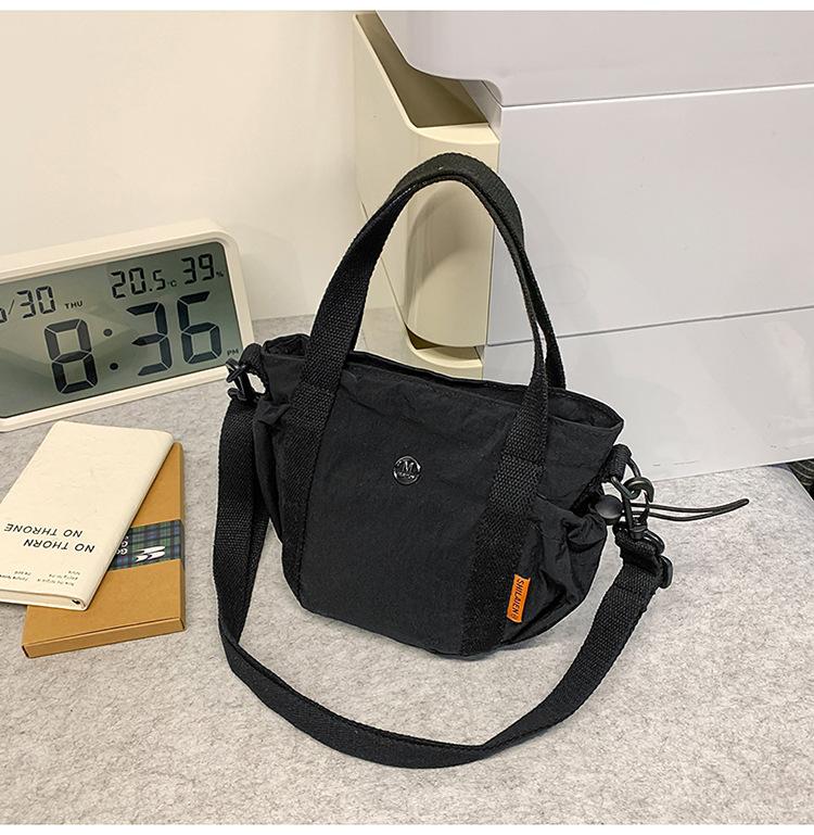 School bag Korean version ins Simple large-capacity messenger bag Versatile commuting to work and class Shoulder bag Outdoor sports small satchel