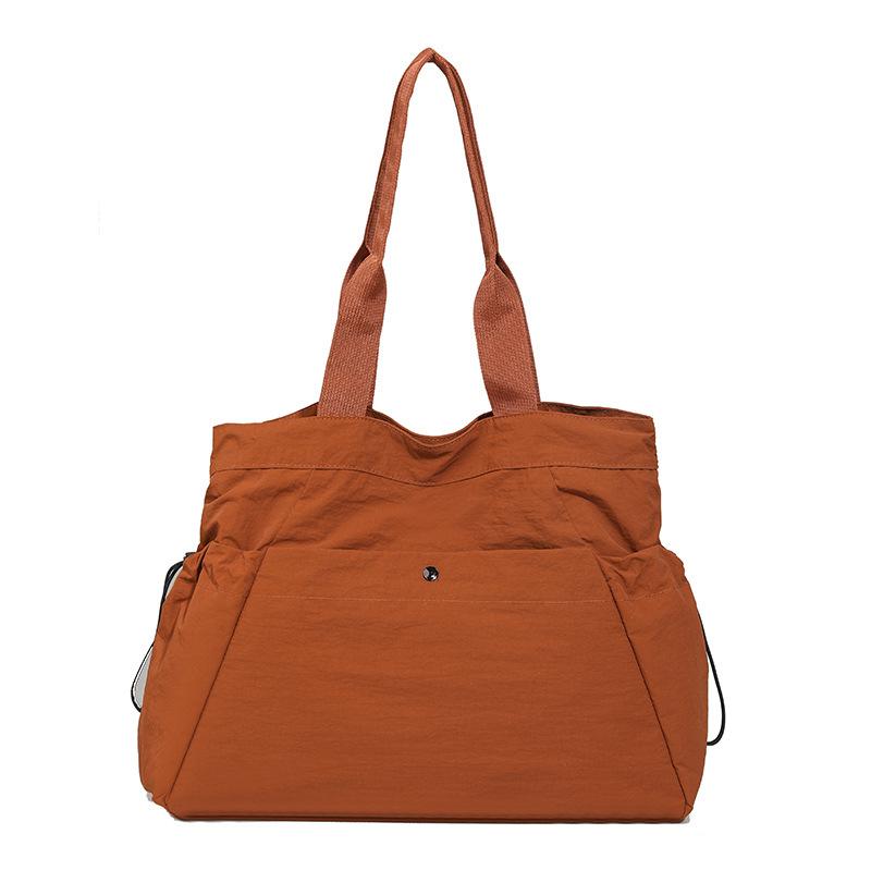 

Велика містка сумка-тоут жіноча водонепроникна дорожня сумка легка сумка на плече зі шнурком помаранчевий