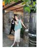 2025 Elegant Miyake Sleeveless Top & Pleated Tassel Midi Skirt Set for Women