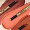 Choose one of the Hourglass Phantom Volumizing Glossy Balms