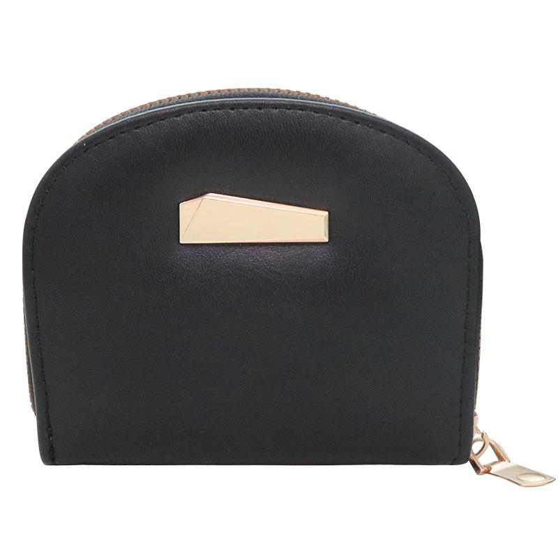 The new card bag is a simple clutch bag, a shell-shaped small change bag, and a women's mini storage card bag.