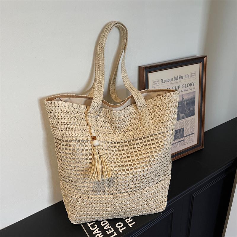 Woven Straw Tote with Tassel Accent and Spacious Interior for Summer Beach or Casual Daily Use