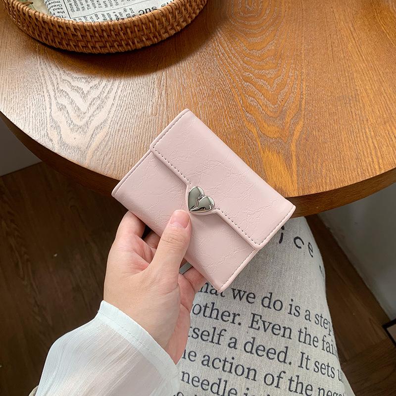 New trendy heart-shaped wallet, fashionable solid color peach heart three-fold small card bag, thin women's short wallet.