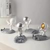 Spaceman Phone Holder: Creative Astronaut Figurine for Desktop Décor & DIY Ornament.