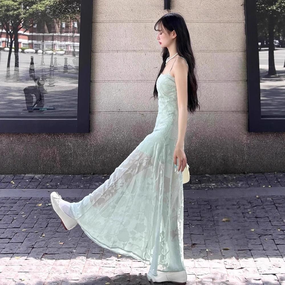 Seaside vacation wind green suspender dress women's summer temperament mesh stitching waist thin a-word skirt long dress