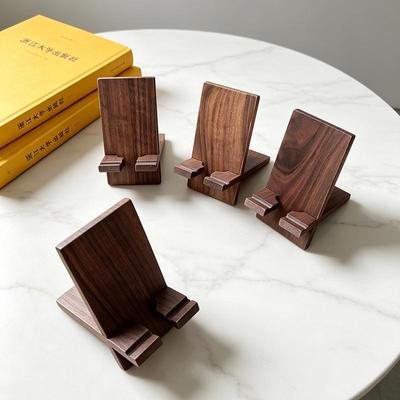 Popular Black Walnut Mobile Phone Display Stand - Solid Wood, Detachable, and Portable Desktop Holder
