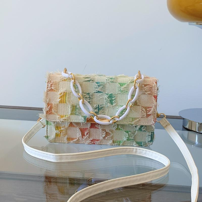 Fashionable Medium-sized Canvas Handbag With Unique Stitching And Tassel Features