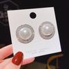 Light luxury celebrity exaggerated pearl stud earrings Korean version temperament versatile geometric circle earrings fashion popular