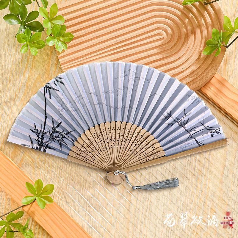 Chinese-Inspired Folding Fan: Ancient Style for Women, Children, and Students - Perfect for Hanfu, Cheongsam Dances, and Portable Summer Use.