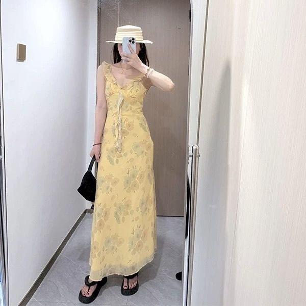 Coffee break French yellow floral suspender dress seaside vacation beautiful ruffle leaf temperament waist dress