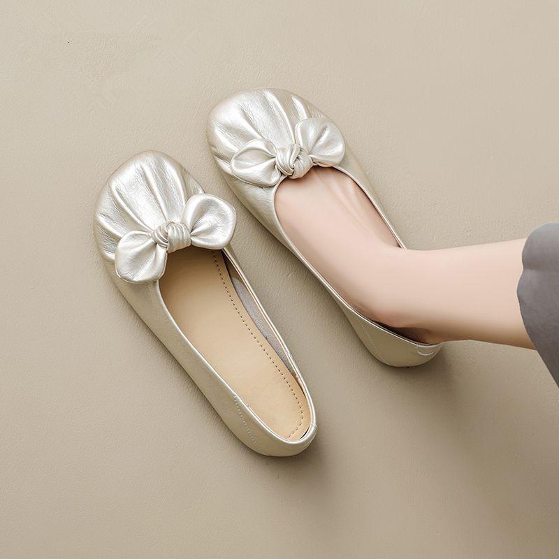 Bow flat-soled single shoes women's spring and autumn new shallow mouth round head soft leather comfortable versatile shoes