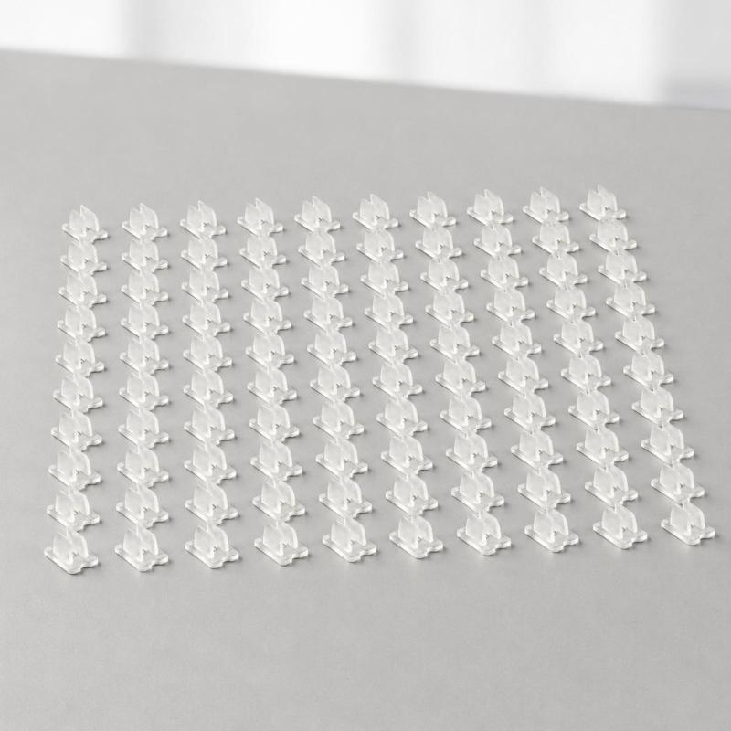 Clear LED Tape Fasteners, Plastic LED Ribbon Holders, with Two Opposing Prongs and Flat Mounting Bases for Direct Placement and Organized Routing