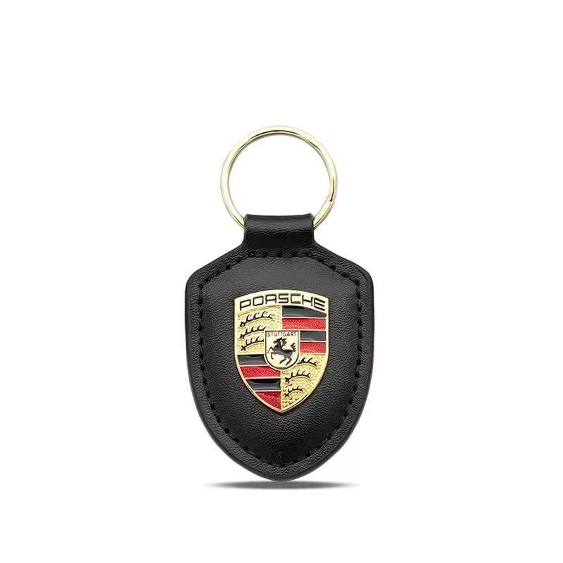

Кожаный Щит Логотип Автомобиля Брелок для Ключей Подвеска Подарок для Porsche Cayenne Panamera Macan 911 Taycan Boxster Cayman 918 Pajun