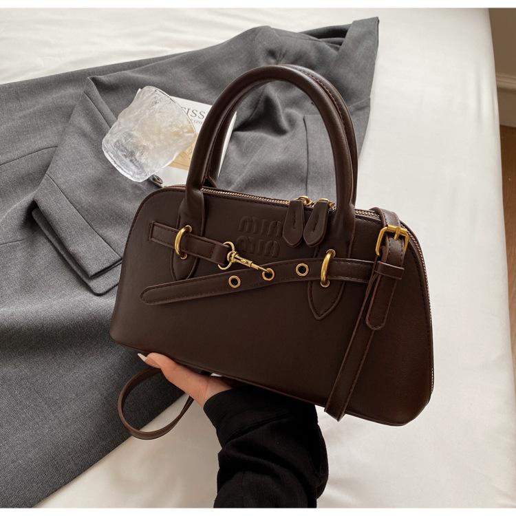 

Niche portable commuter bag women s 2025 new fashion retro shell bag simple large-capacity messenger bag кавовий
