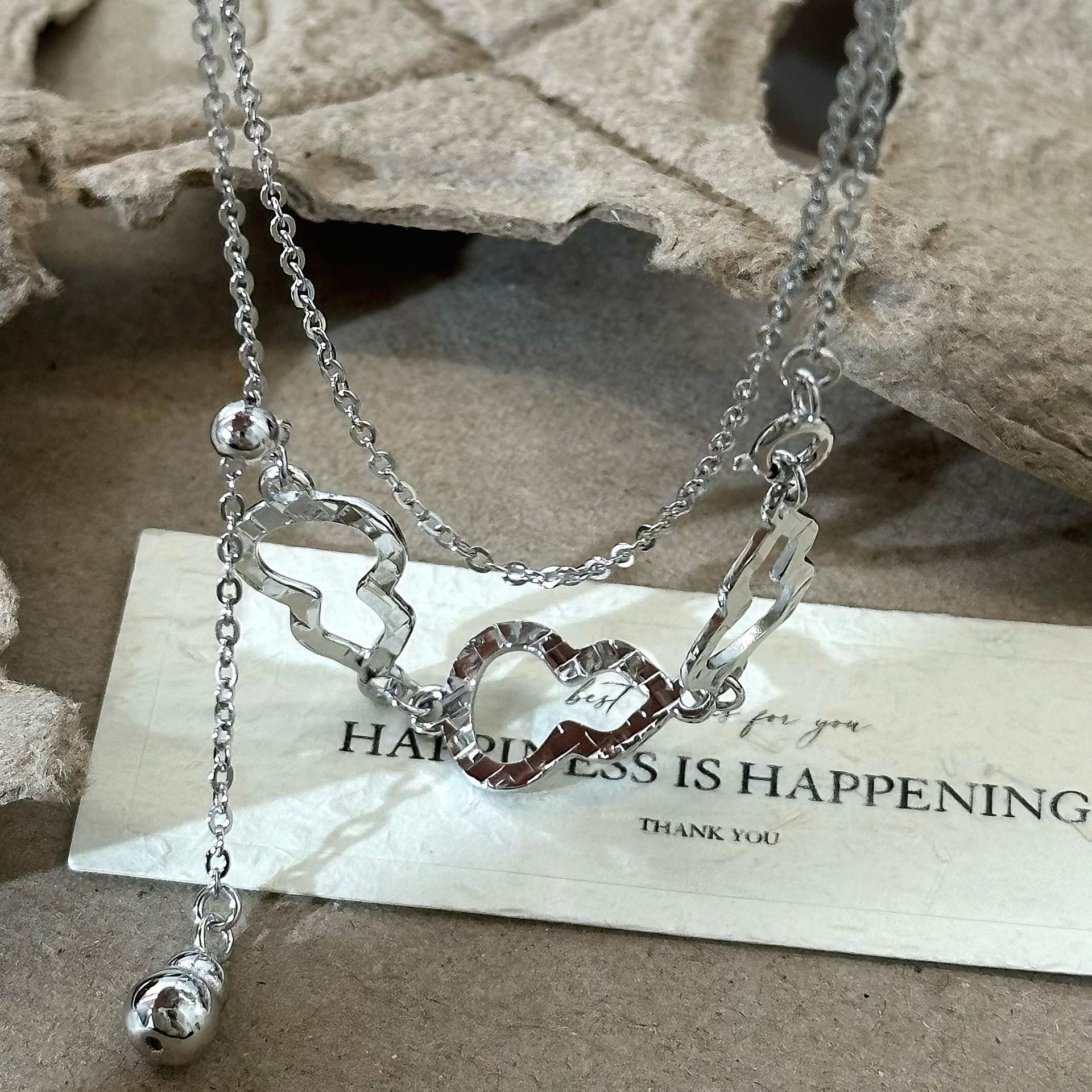 

Elegant S925 Sterling Silver Hollow Gourd Necklace for Women - Niche Design, Fortune, and Prosperity Patchwork Pull-Out Chain