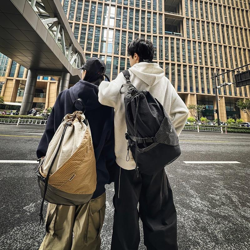 Nouveau sac à dos décontracté pour hommes automne et hiver, sac messager pour étudiant, sac à dos de sport ultra-léger à cordon de serrage style street