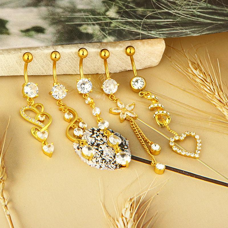 Piercing pentru buric din zirconiu și cupru cu accente aurii, cu inel argintiu și cataramă din oțel inoxidabil