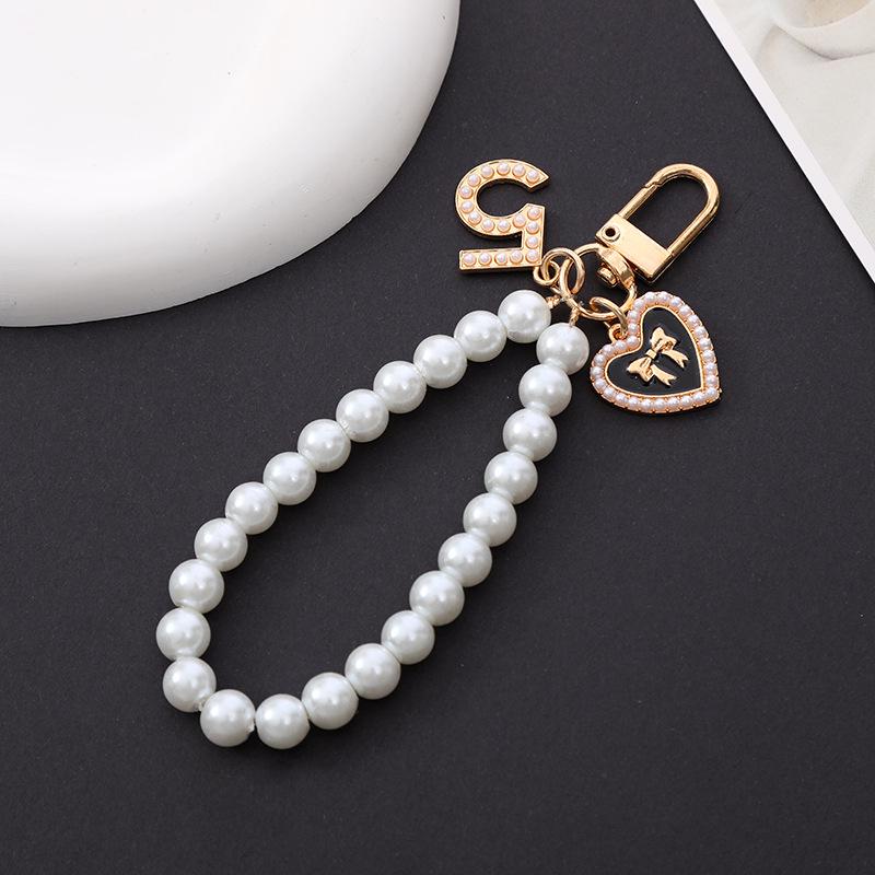 Schicke Perlenblumen-Anhänger Handyhülle & Handtaschenanhänger für Damen