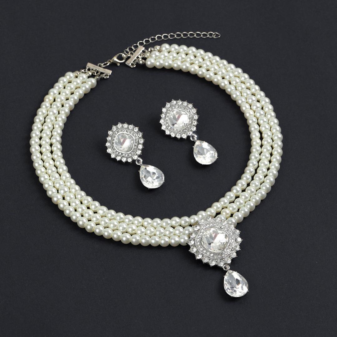 

Элегантный Высококлассный Модный Жемчужный Ювелирный Набор: Универсальное ожерелье, серьги и браслет - Изысканный европейский и американский стиль