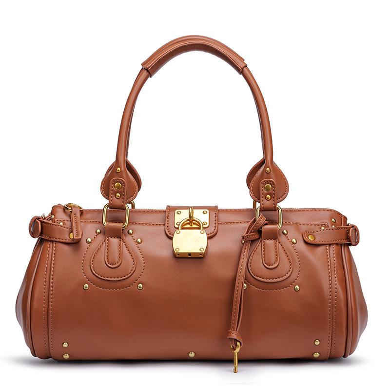 New Lock Trendy Classic New Sweet Cool Motorcycle Style Rivet Bag Handheld Large Capacity Pillow Women s Bag
