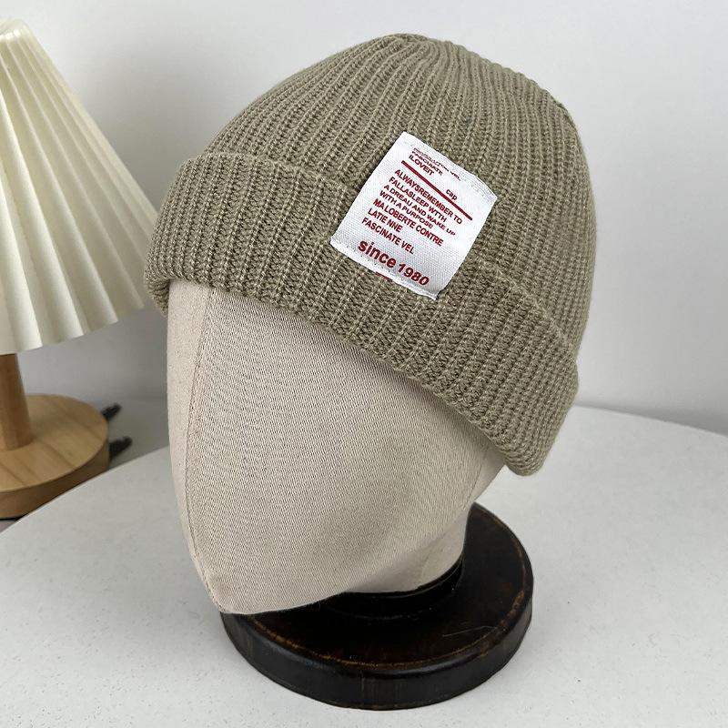 Winter Warm Wool Hat Women's Outdoor Ear Protection Labeling Knitted Cold Hat Student Cycling Morning Running Windproof Pullover Hat