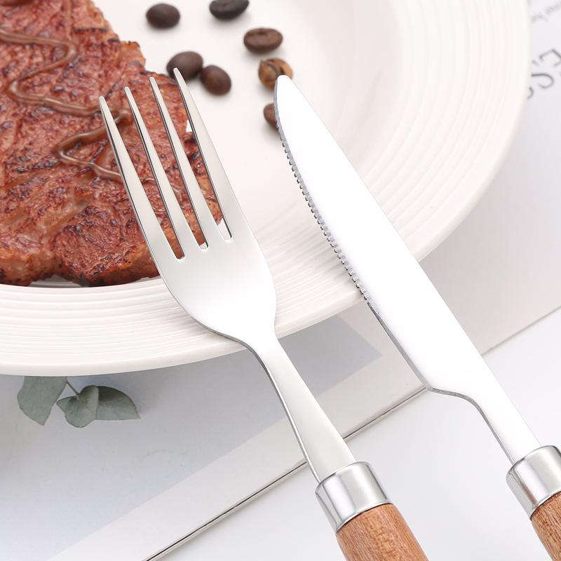 Japanese 304 Stainless Steel Cutlery Set with Wooden Handles: Knife, Fork, Spoon, Dessert Spoon, and Steak Knife for Western Cuisine and Hotel Use.