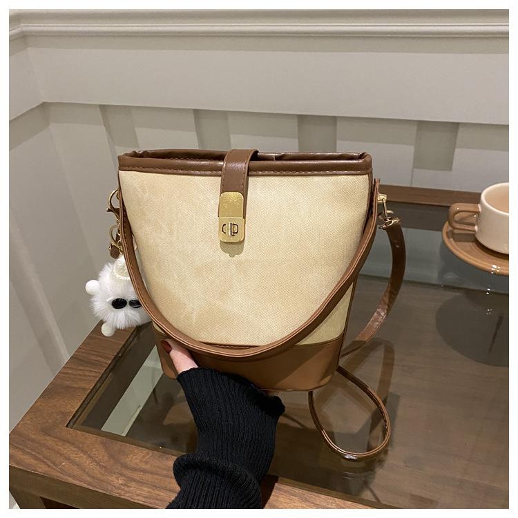 Fashion Autumn and Winter Lock Casual 2025 New Trend Large Capacity Retro Color Matching Crossbody Handheld Bucket Bag Women