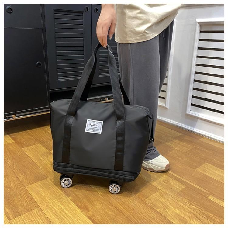 Extra-Large Expandable Travel Duffel with Wheels: Wet/Dry Separation, Lightweight & Practical for Prenatal Storage & Business Trips.
