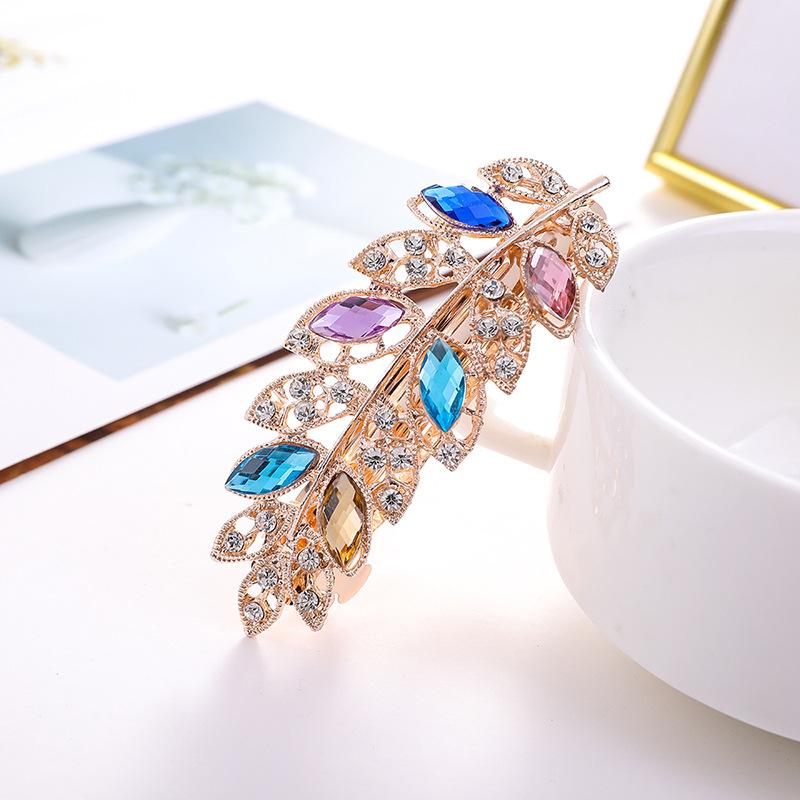 

Женская мода Цветочный лист Кристалл Кристалл Камень Заколка для волос Заколка для волос Ювелирные изделия Брелок для волос