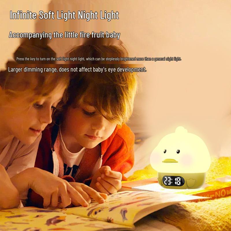 Duck Silicone Alarm Clock with Night Light and Cartoon Tap Feature