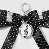 Trendy Musical Note Keyring Key Holder Featuring Piano Keys And Delicate Bowknot Perfect For Music Enthusiasts