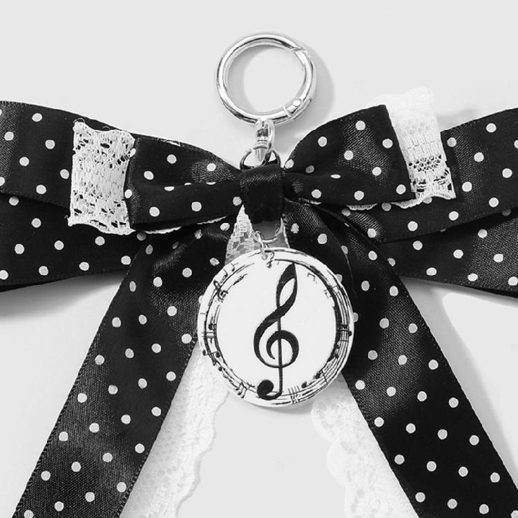Trendy Musical Note Keyring Key Holder Featuring Piano Keys And Delicate Bowknot Perfect For Music Enthusiasts