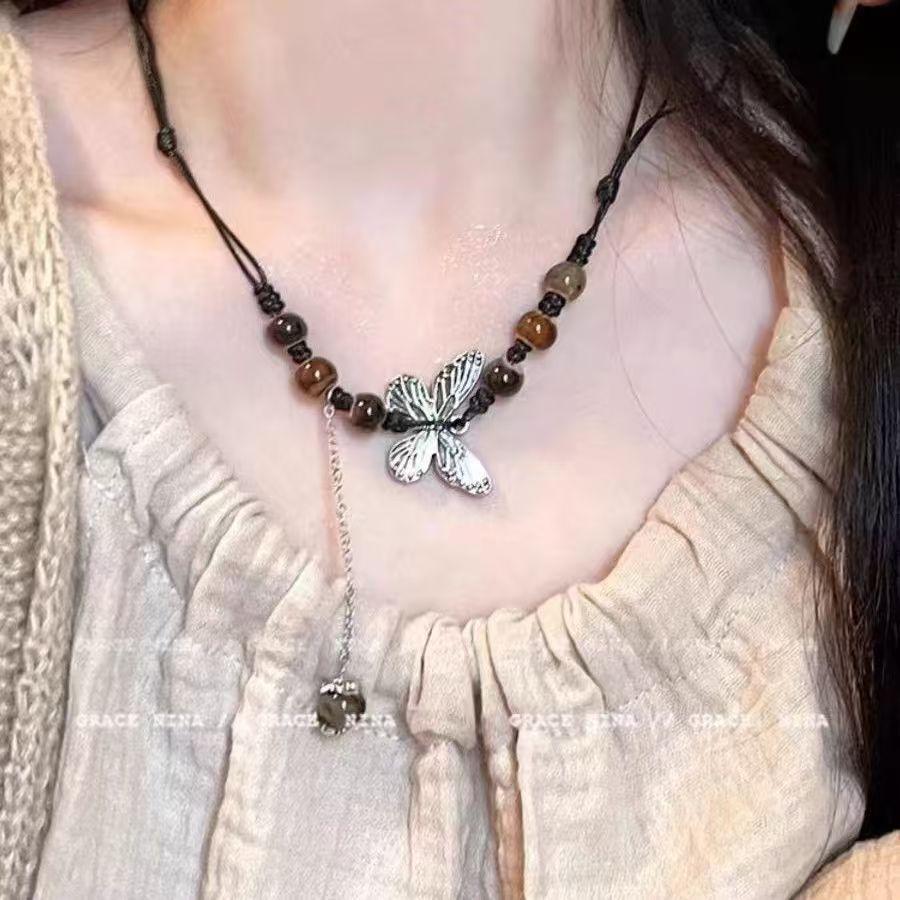 New Chinese ethnic style butterfly necklace niche ancient style high-end long woven sweater chain Maillard collarbone chain